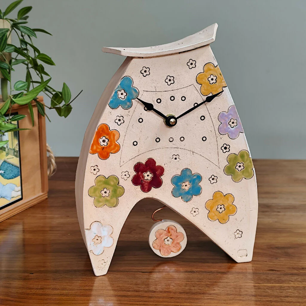Large Mantel Clock in bright coloured blooms.