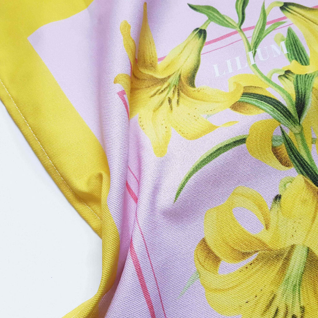 Lily Print Cotton Tea Towel in Pink and Yellow - Image 2