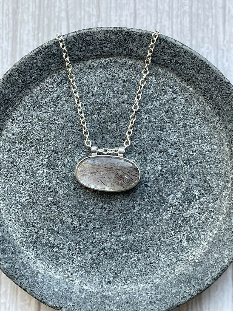 Oval shaped super seven crystal necklace