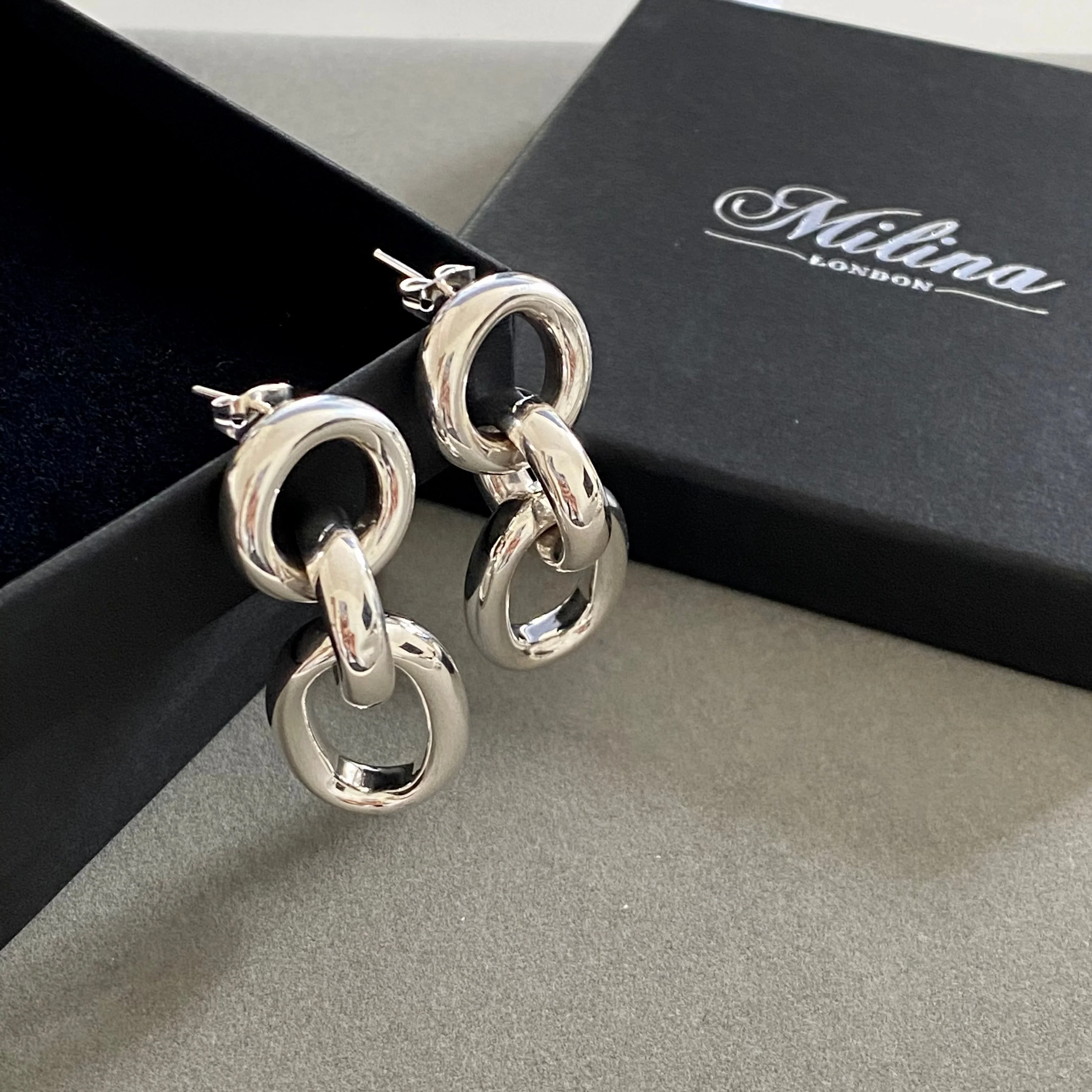 Three Small Interlinked Sterling Silver Oval Hoop Earrings - Image 3