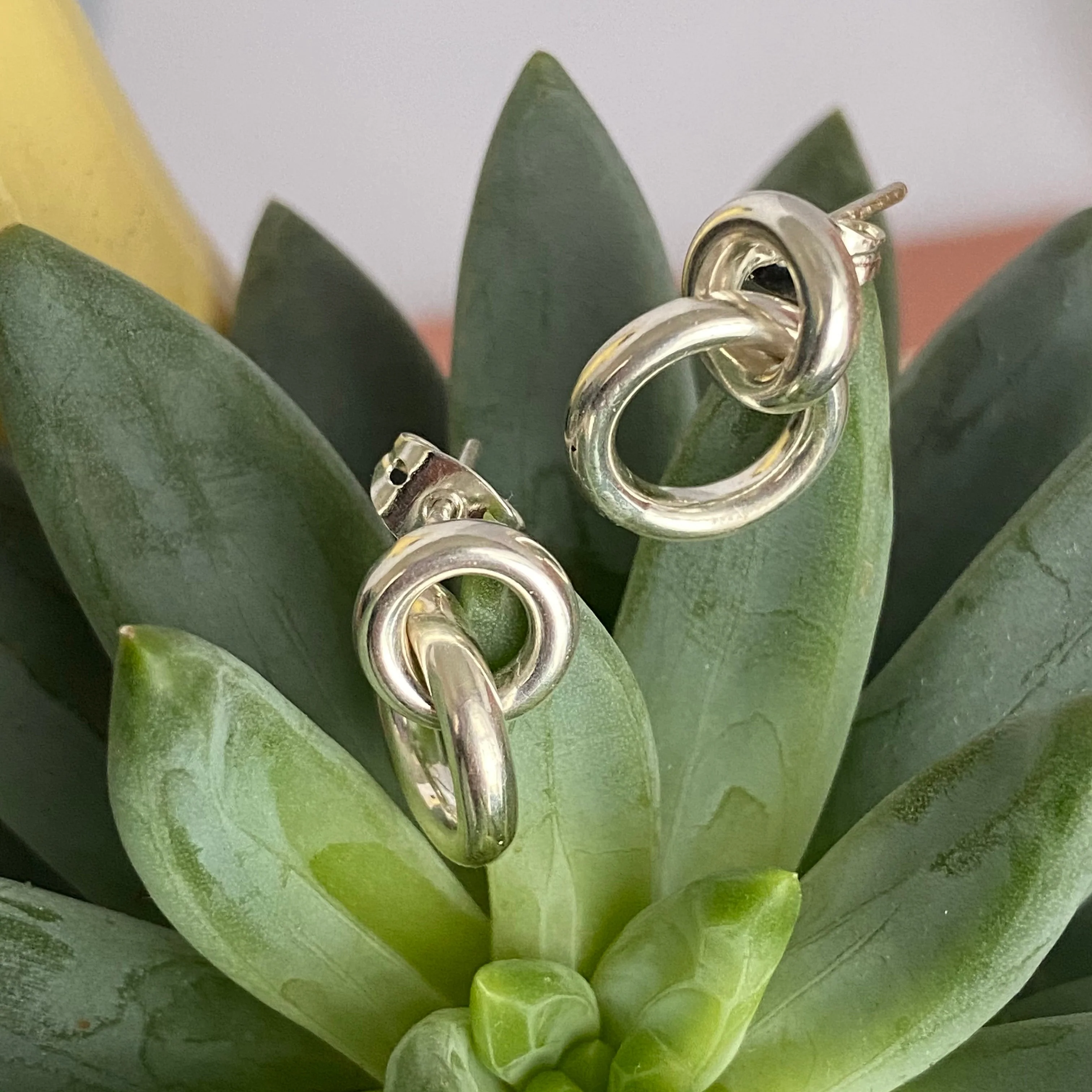 Two Small Interlinked Hoop Sterling Silver Stud Earrings - Image 3